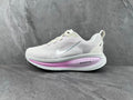 Nike ZoomX White and Lavender Sneakers for Running - product image from the listing.