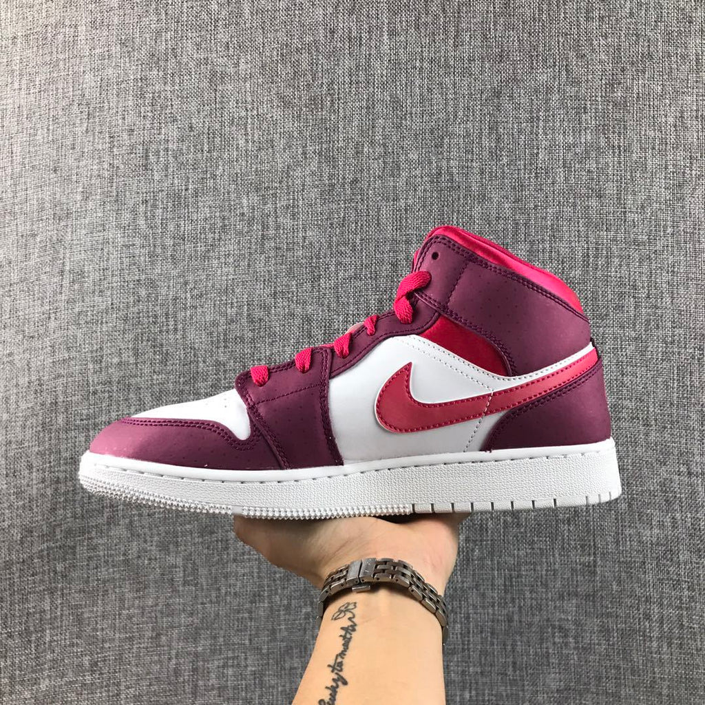Air Jordan 1 High Sneakers in White, in Pink and Burgundy - product image from the listing.