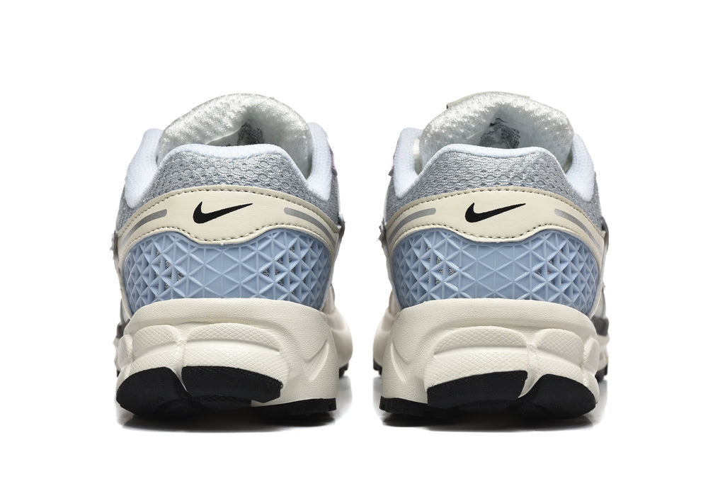 Nike Vomero 5 Trainers in Cream, Silver and Lavender - product image from the listing.