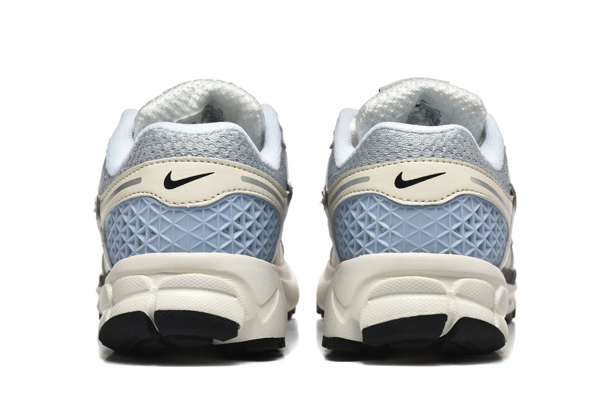 Nike Vomero 5 Trainers in Cream, Silver and Lavender - product image from the listing.