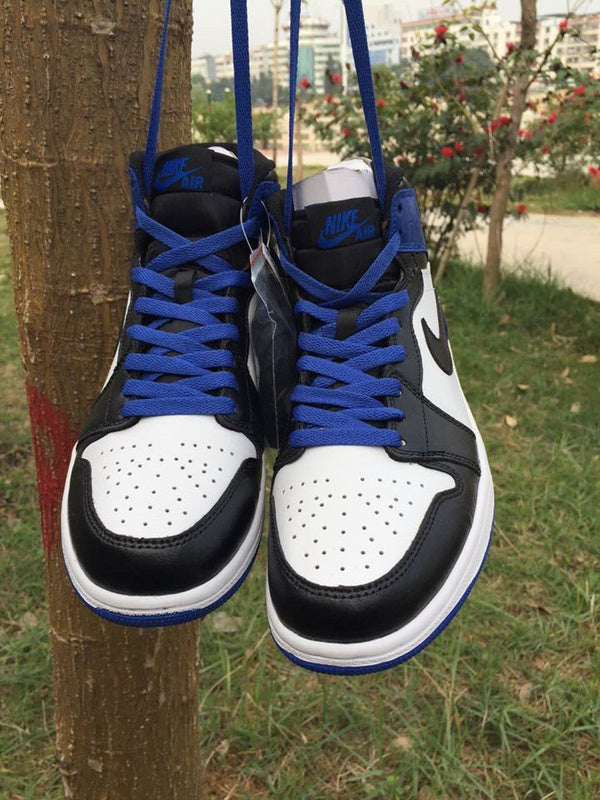 Jordan 1 High Sneakers in Black, in White and Royal Blue - product image from the listing.