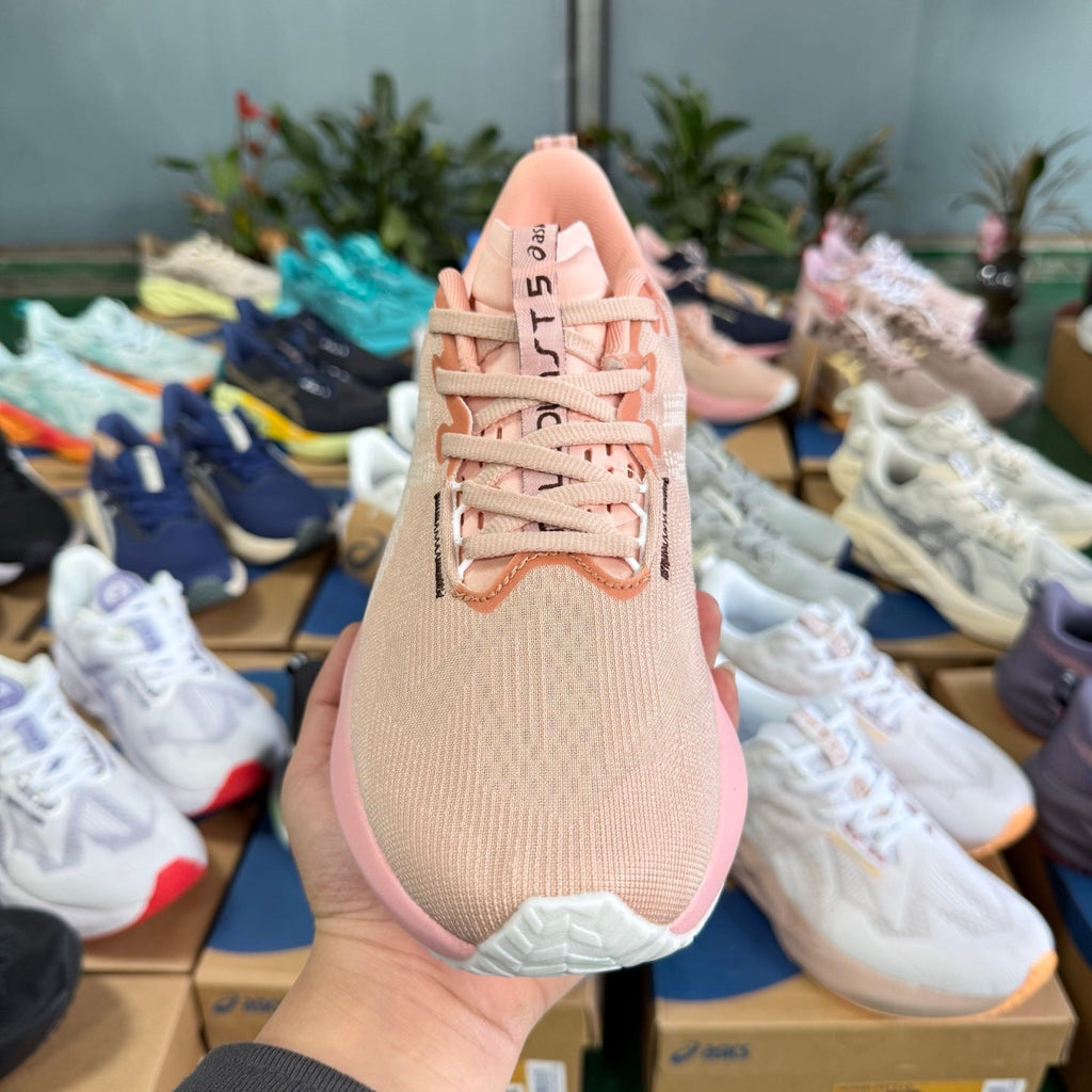 ASICS Novablast 5 LE Running Shoes in Pink - product image from the listing.