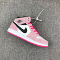 Jordan 1 Mid Sneakers in Pink White Black 852542-801 - product image from the listing.