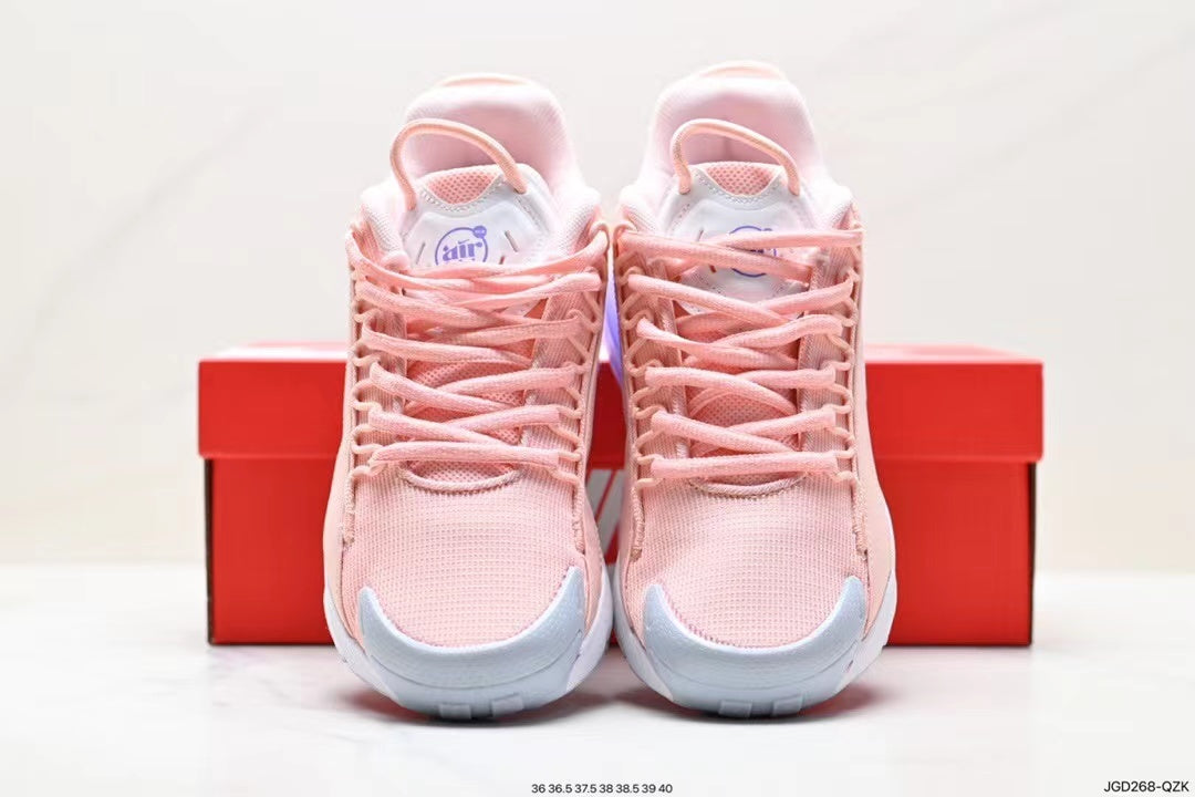 Nike Air Max 270 React Sneakers in Pink Orange Purple - product image from the listing.