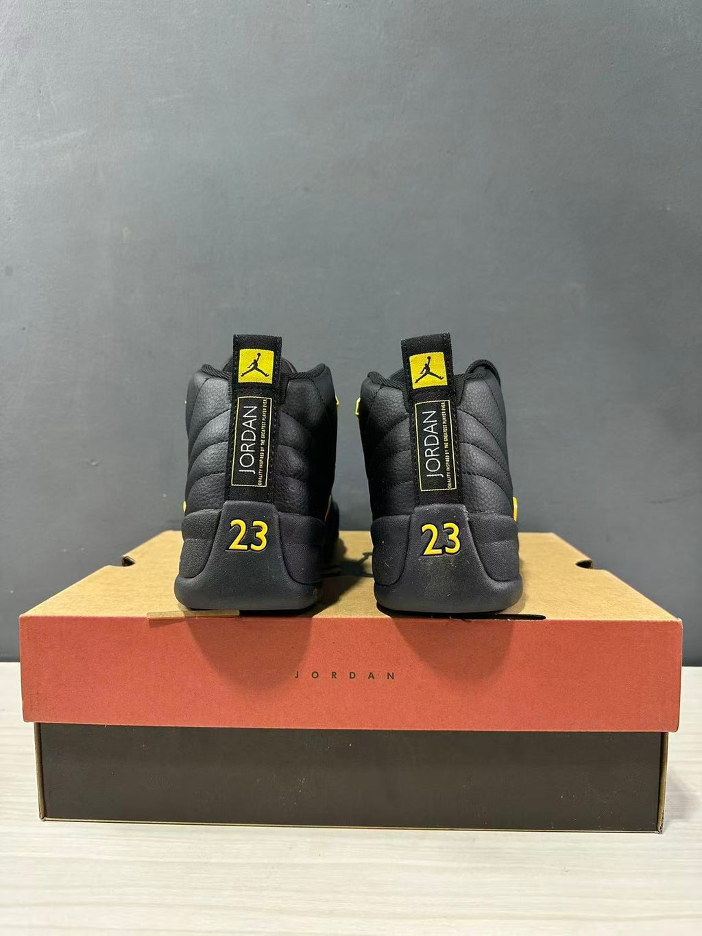 Air Jordan 12 Retro Black Taxi Sneakers CT8013-071 - product image from the listing.