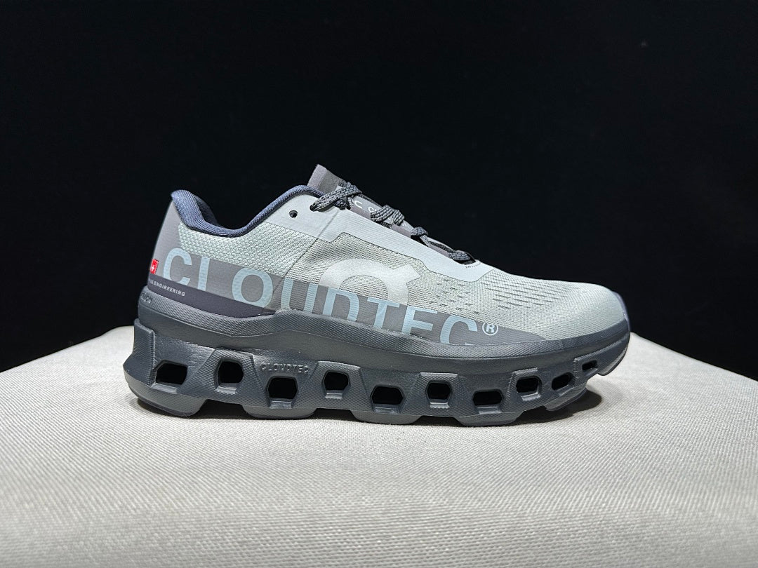 On Cloudmonster Shoes for Running in Eclipse and Magnet - product image from the listing.