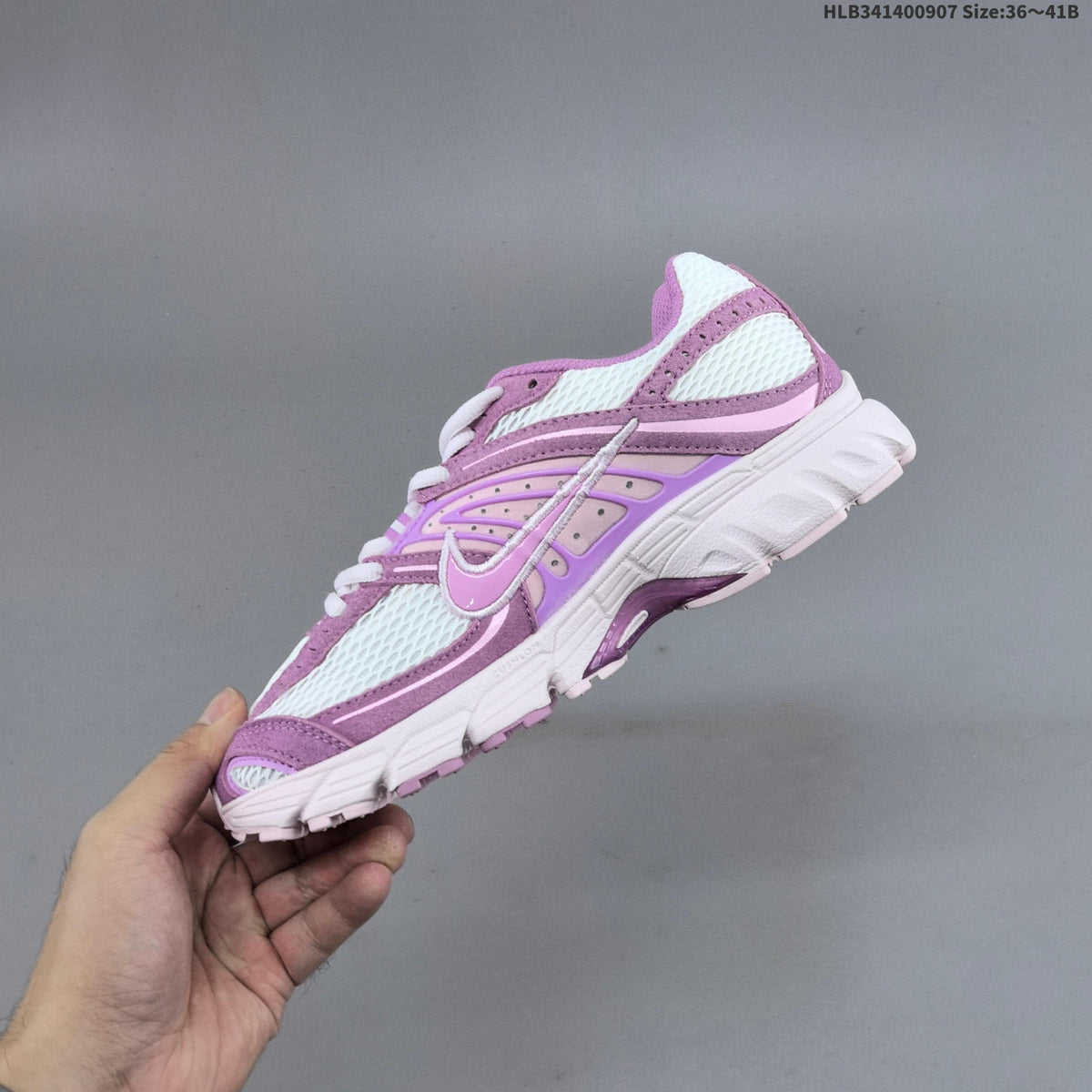 White and Purple Nike Air Max Moto Sneakers - product image from the listing.