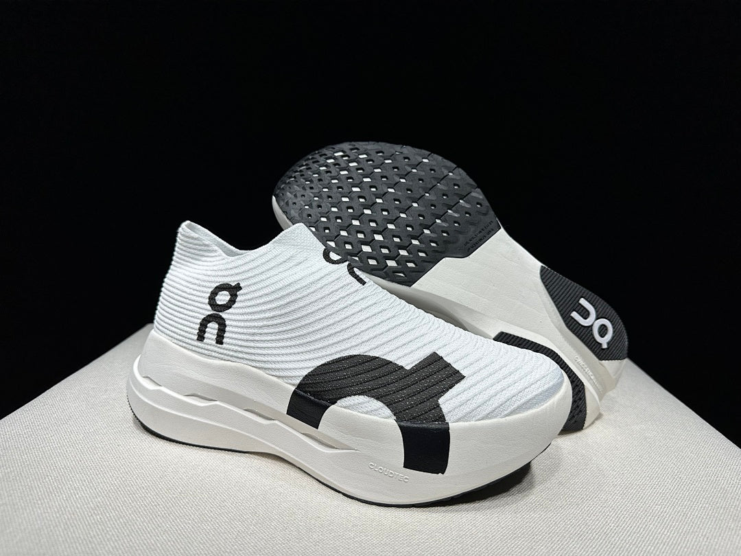 On Cloudboom Strike LS Running Shoes in White Black - product image from the listing.