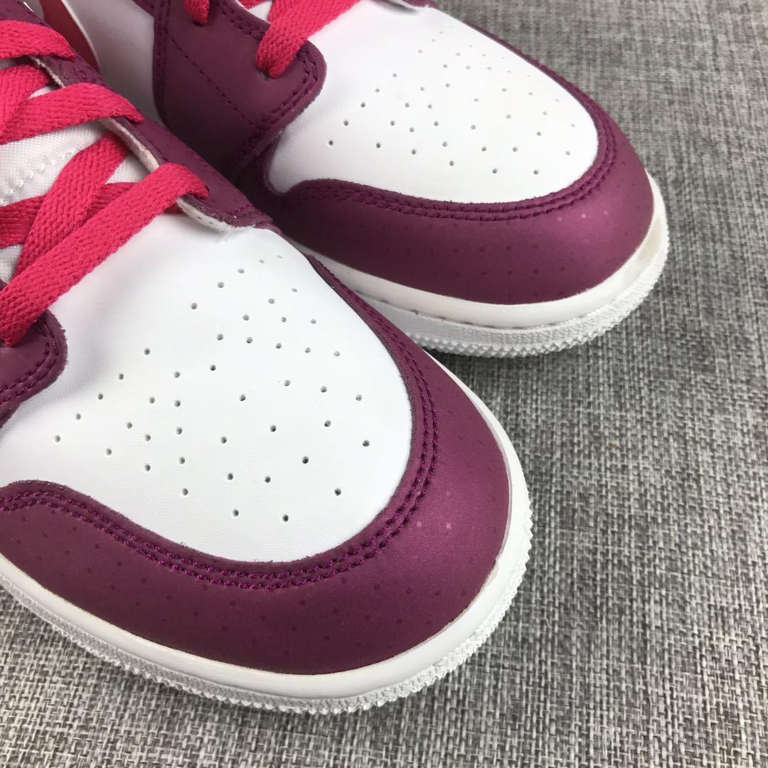 Air Jordan 1 High Sneakers in White, in Pink and Burgundy - product image from the listing.