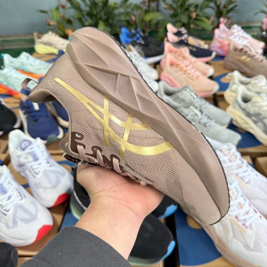 ASICS NOVABLAST 5 LE Running Shoes in Brown - product image from the listing.