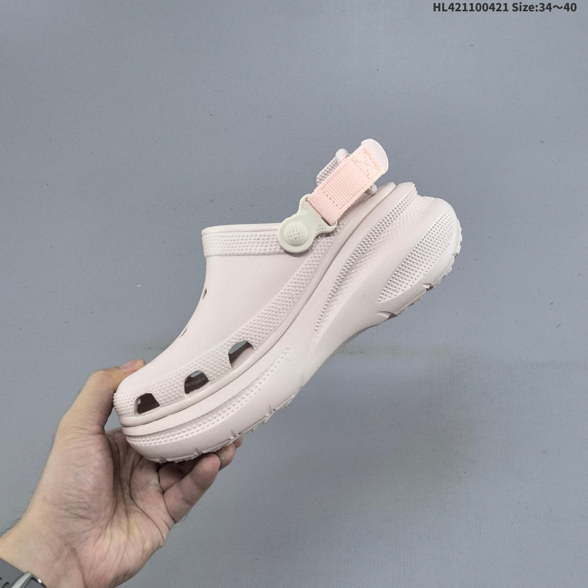 Platform Clogs with Vent Holes and Heel Straps by Crocs - product image from the listing.