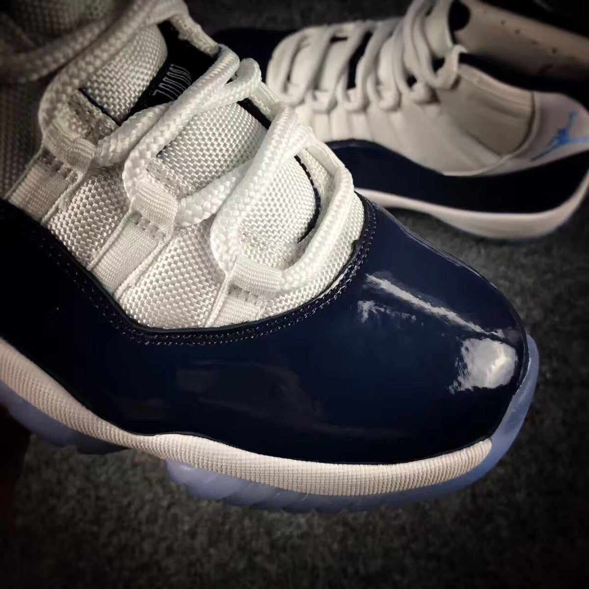 Air Jordan 11 Navy Sneakers - product image from the listing.
