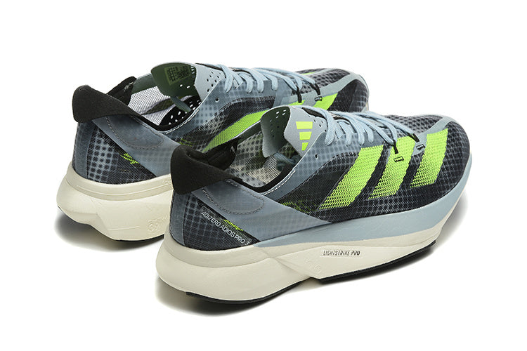 Adizero Adios Pro Running Shoes in Gray and Neon in Green - product image from the listing.