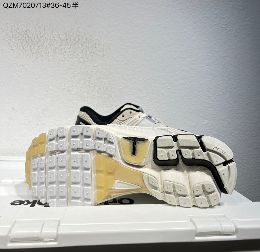 Nike Air Zoom Vomero 5 Sneakers in White, in Black and Beige - product image from the listing.
