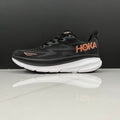 HOKA Clifton 9 Running Shoes in Black and Gold - product image from the listing.