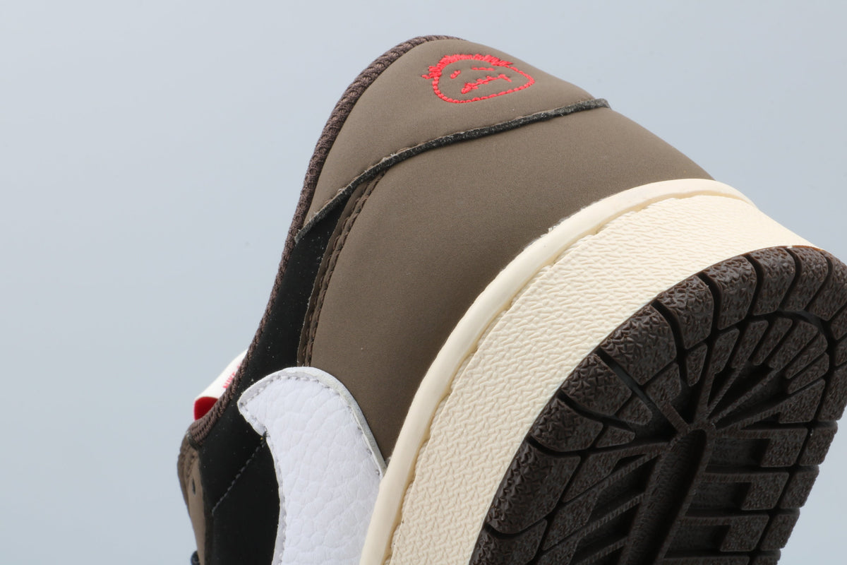 Black and Brown Sneakers with White Swoosh - Jordan 1 Low - product image from the listing.