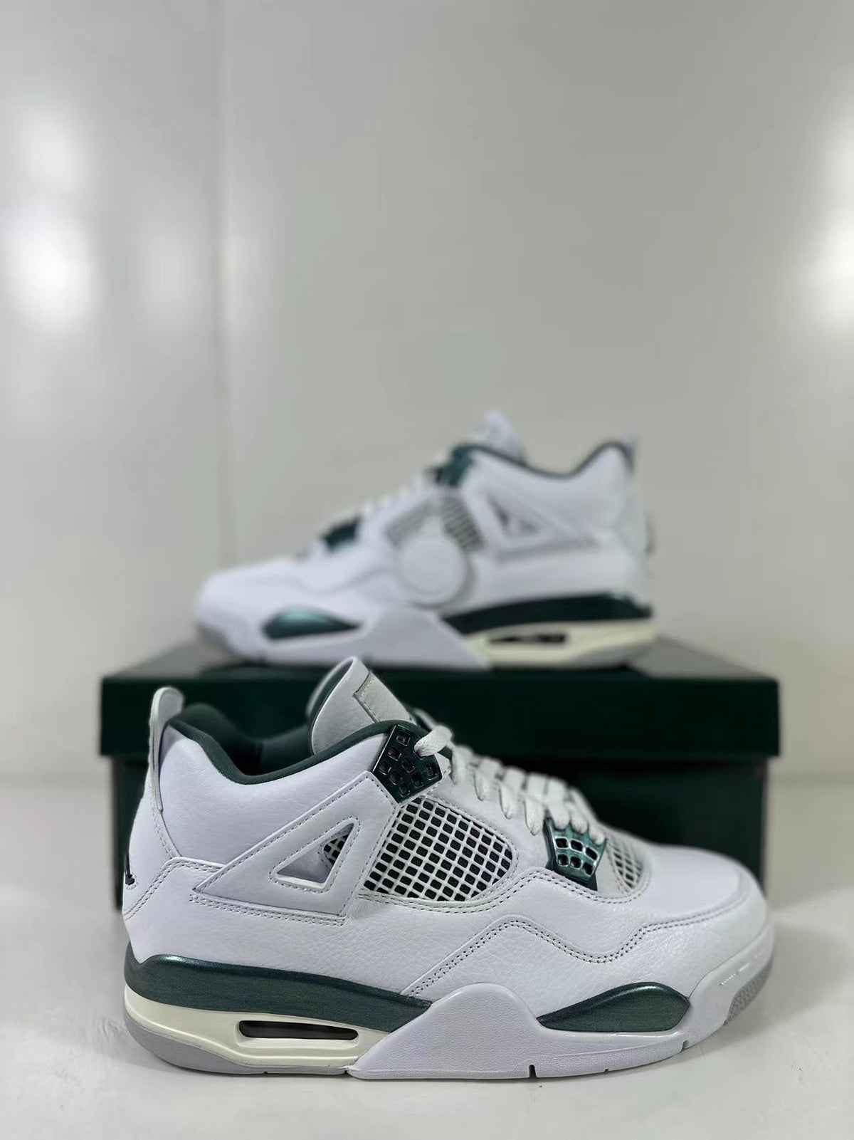 Air Jordan 4 Retro Bucks White Green Sneakers FQ8138-103 - product image from the listing.