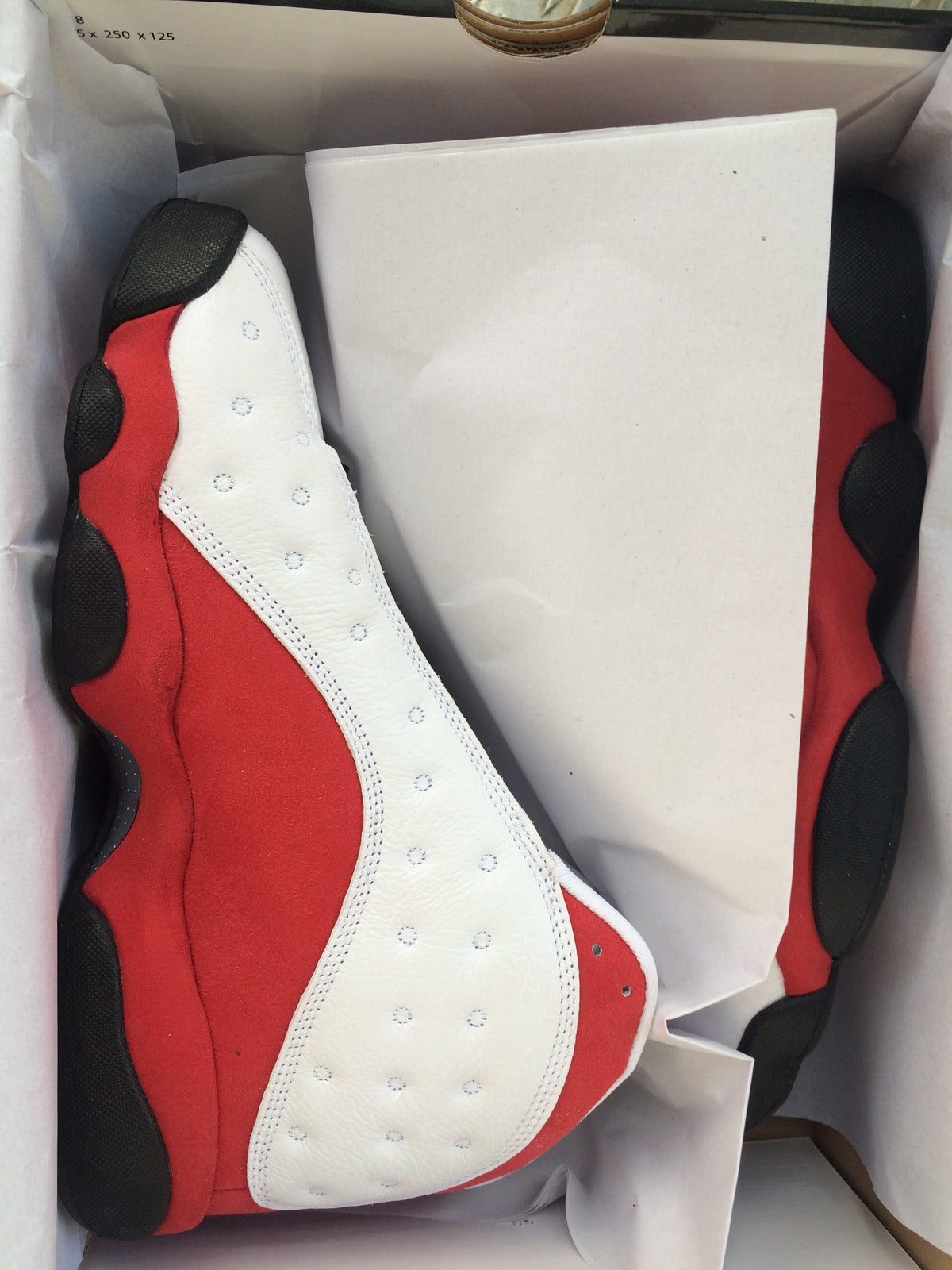Air Jordan 13 Sneakers in White Red Black - product image from the listing.