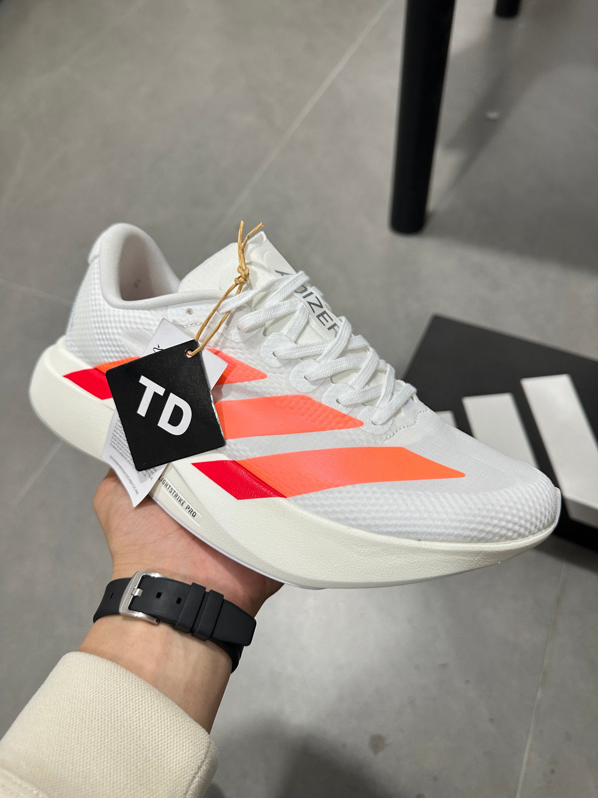 Adidas Adizero EVO SL Running Shoes in White Orange - product image from the listing.
