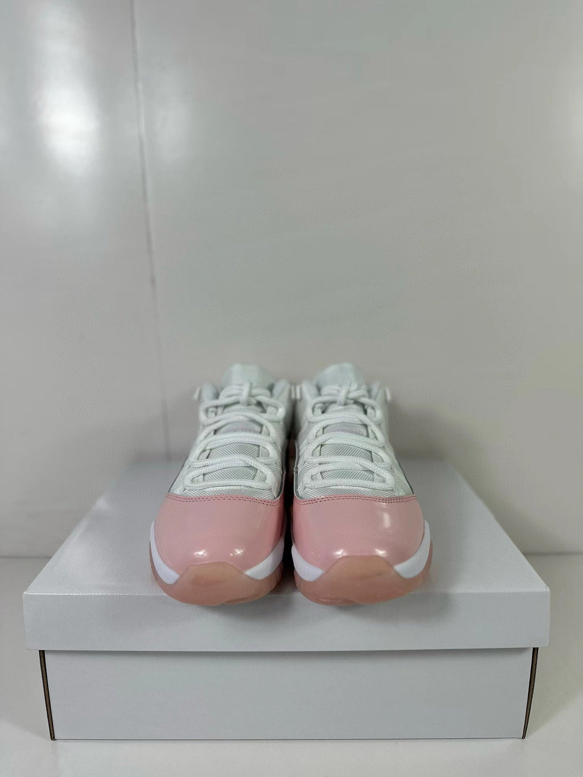 Air Jordan 11 Low Women's Pink Sneakers AH7860-160 - product image from the listing.