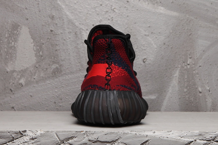 Red and Black Yeezy 350 V2 Knit Sneakers - product image from the listing.