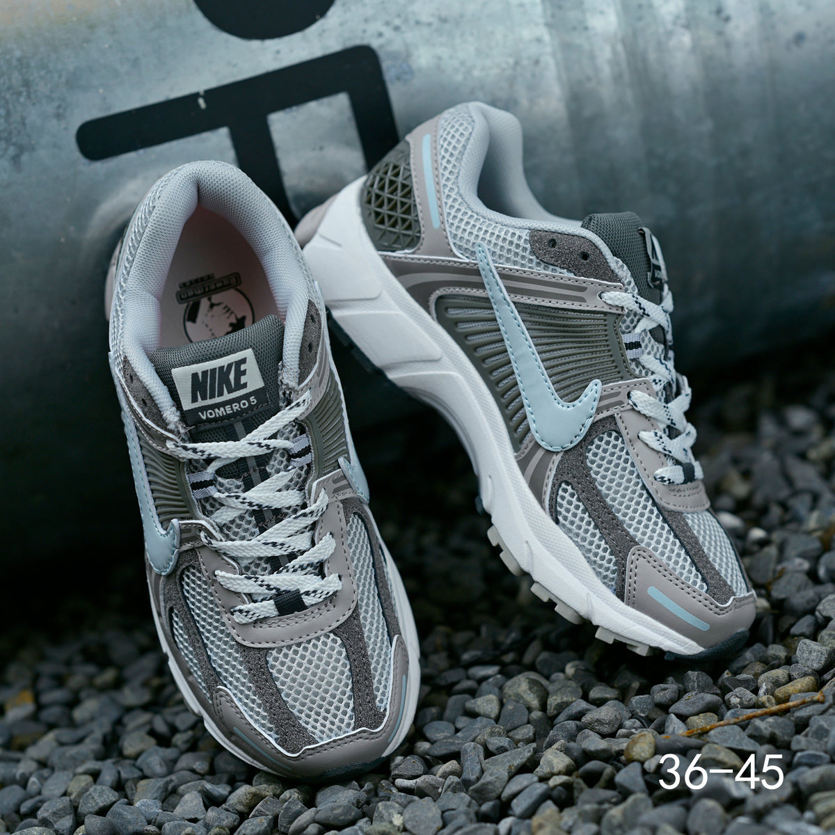 Grey Nike Air Zoom Vomero 5 Running Shoes - product image from the listing.