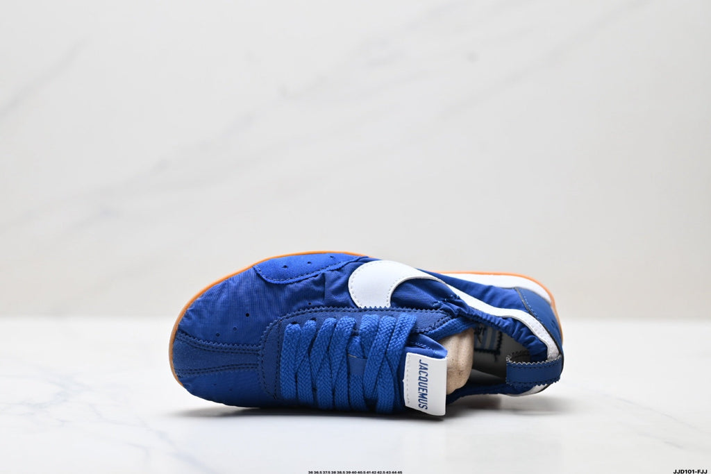 Jacquemus x Nike Jacumoon Low-Top Sneakers, in Blue and White - product image from the listing.