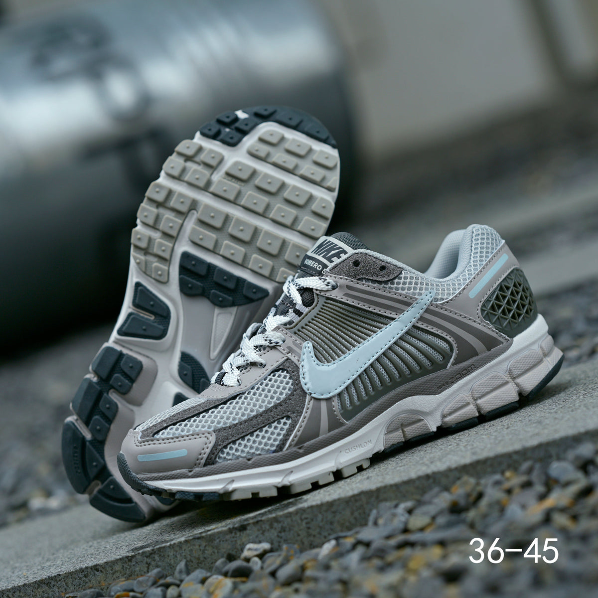 Grey Nike Air Zoom Vomero 5 Running Shoes - product image from the listing.