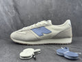 Cream and Blue New Balance U471AA Low-Top Sneakers - product image from the listing.
