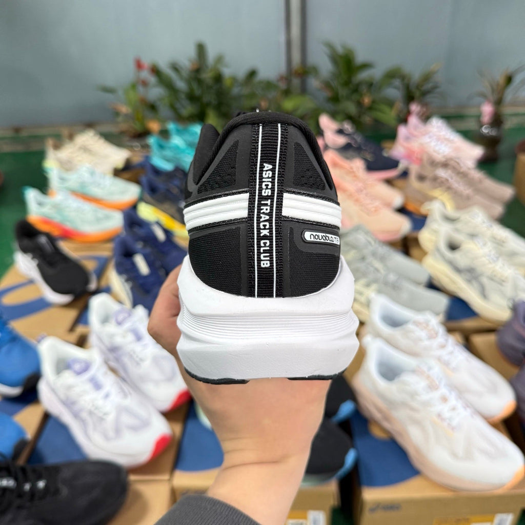ASICS NOVABLAST 5 LE Running Shoes in Black and White - product image from the listing.