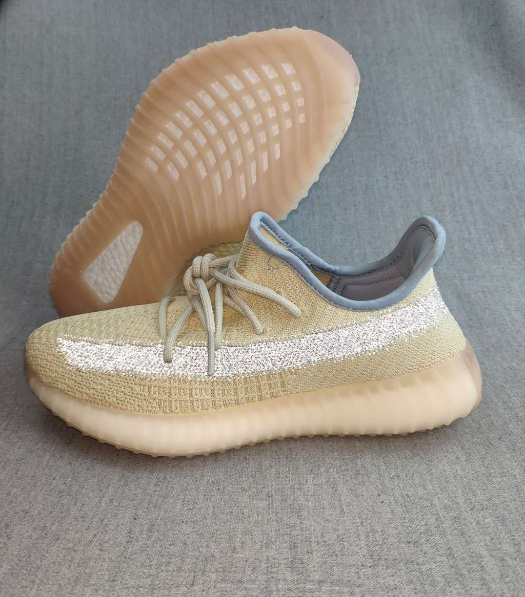 Beige Yeezy Boost 350 V2 Reflective Knit Sneakers - product image from the listing.