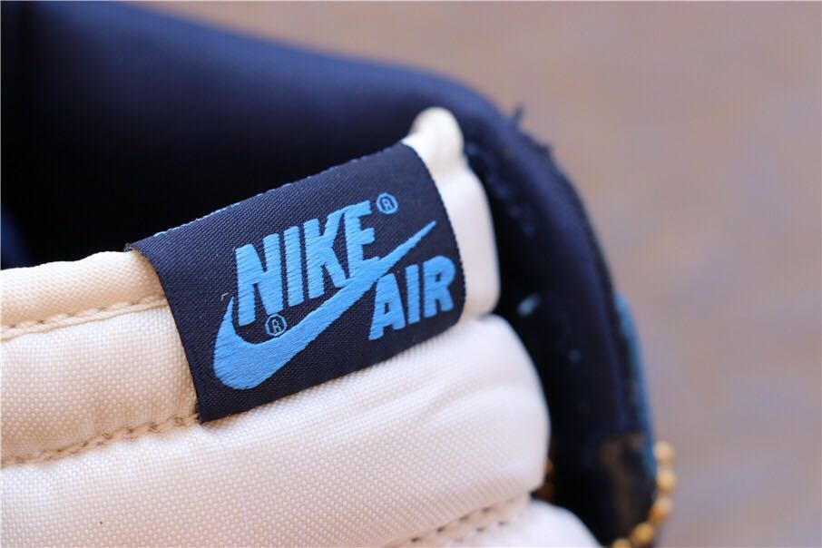 Air Jordan 1 Retro High OG Sneakers in Blue and White - product image from the listing.