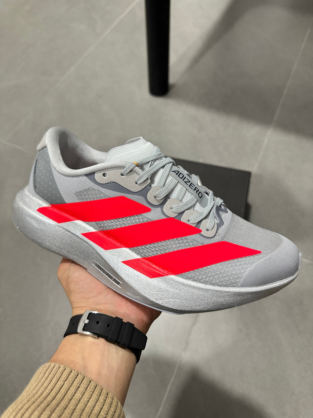 Adidas Lightstrike Pro Running Shoes, in Gray and Red KI3381 - product image from the listing.
