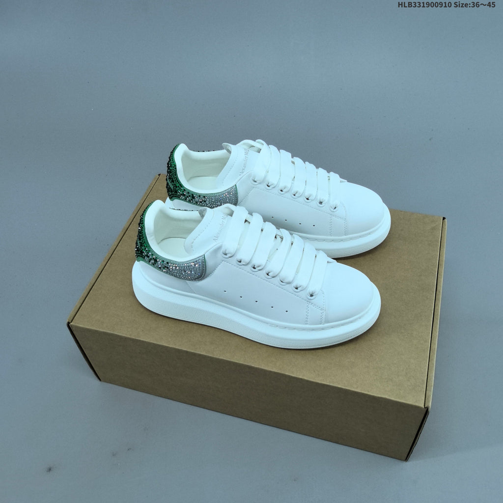 Alexander McQueen Oversized Low-Cut Sneakers with Crystal Heel - product image from the listing.