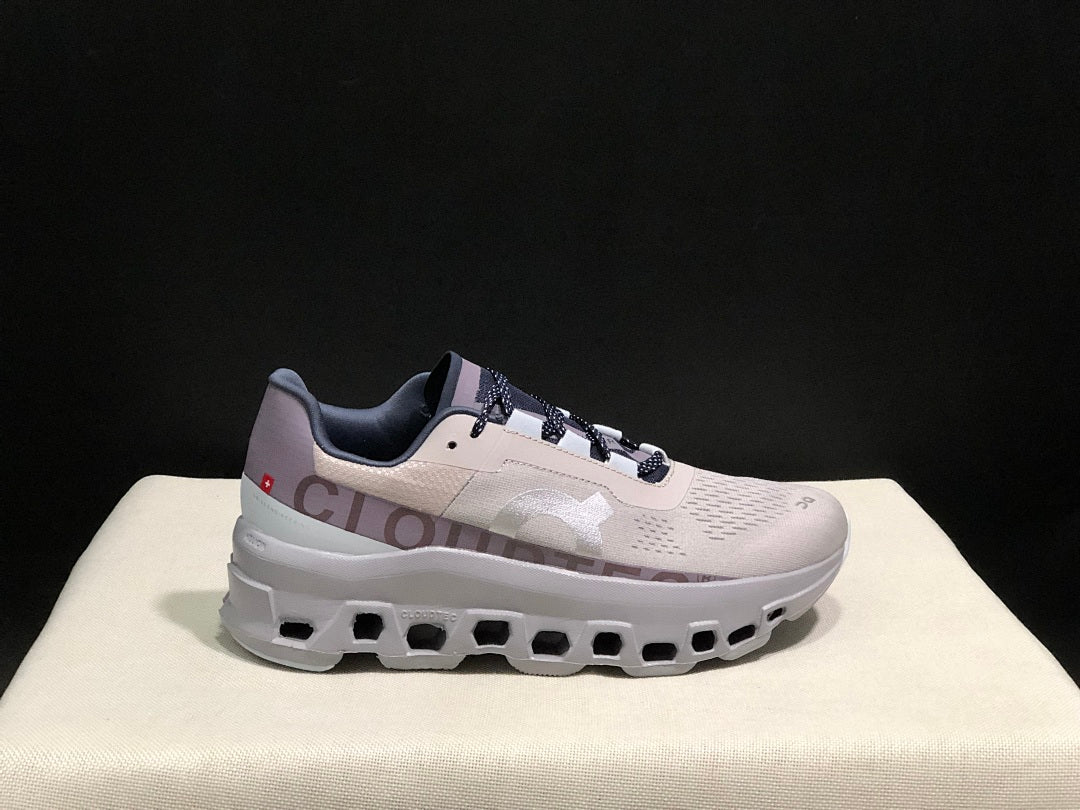 Gray and Purple On Cloudmonster Sneakers - product image from the listing.