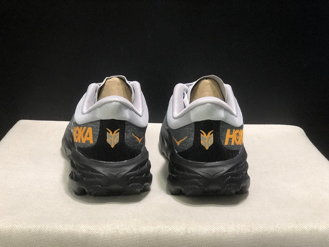 HOKA Speedgoat 5 Trail Running Shoes in White Gray - product image from the listing.