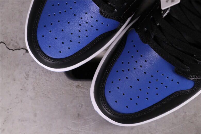 Air Jordan 1 Game Royal High-Top Sneakers in Black Blue White - product image from the listing.