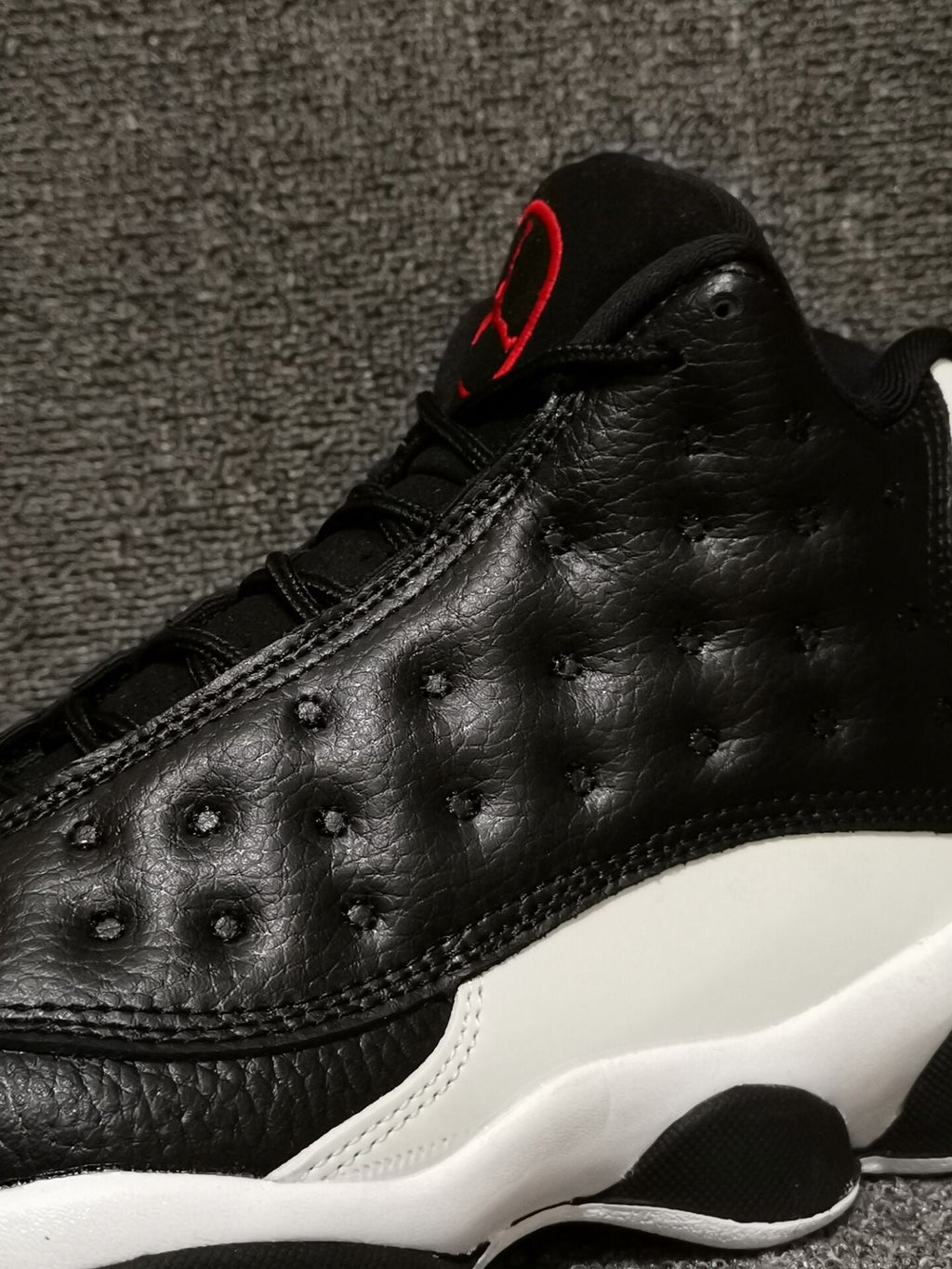 Air Jordan 13 Retro Black Red White Sneakers - product image from the listing.