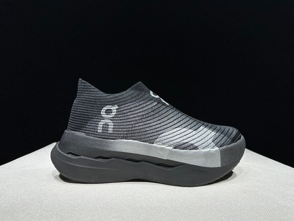On Cloudboom Strike LS Running Shoes in Black Silver - product image from the listing.