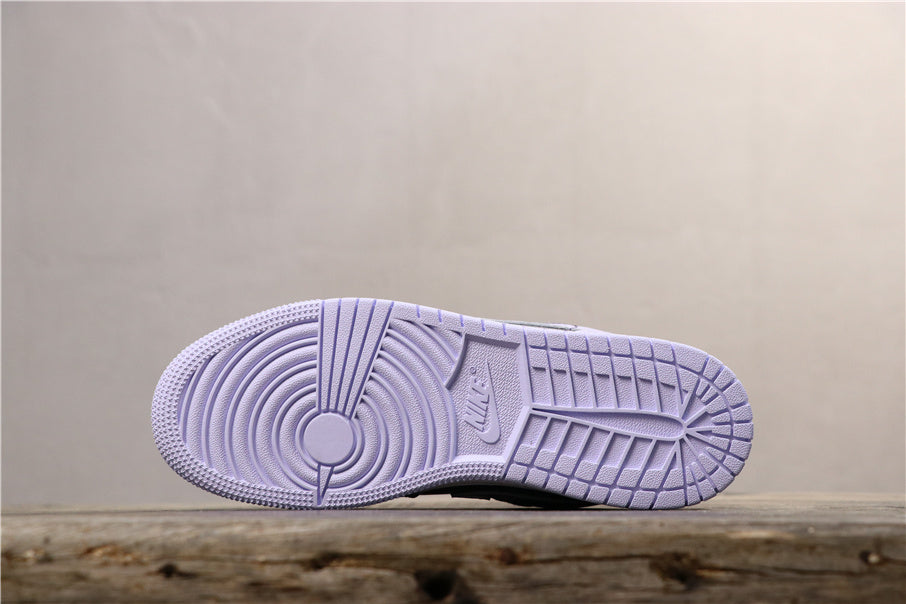 Air Jordan 1 Low GS Oxygen Sneakers in Purple 554723-505 - product image from the listing.