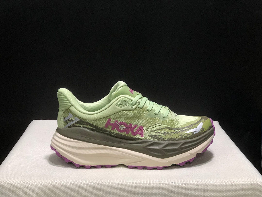 HOKA Stinson 7 Trail Running Shoes in Sage in Green - product image from the listing.