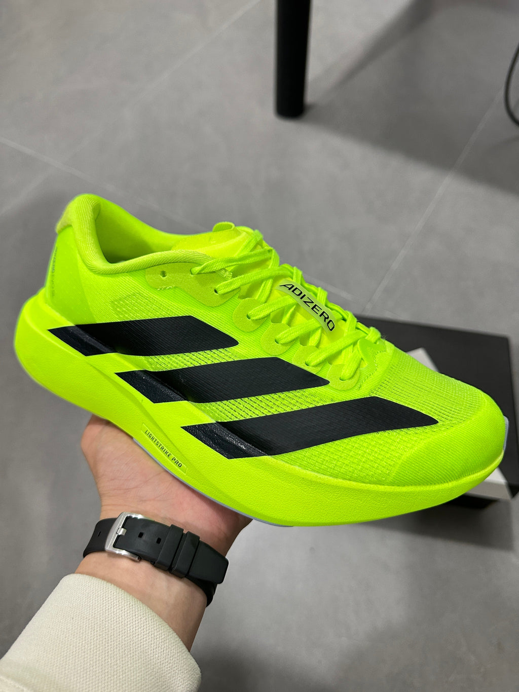 Adidas Adizero Lightstrike Pro Running Shoes, Neon in Green - product image from the listing.