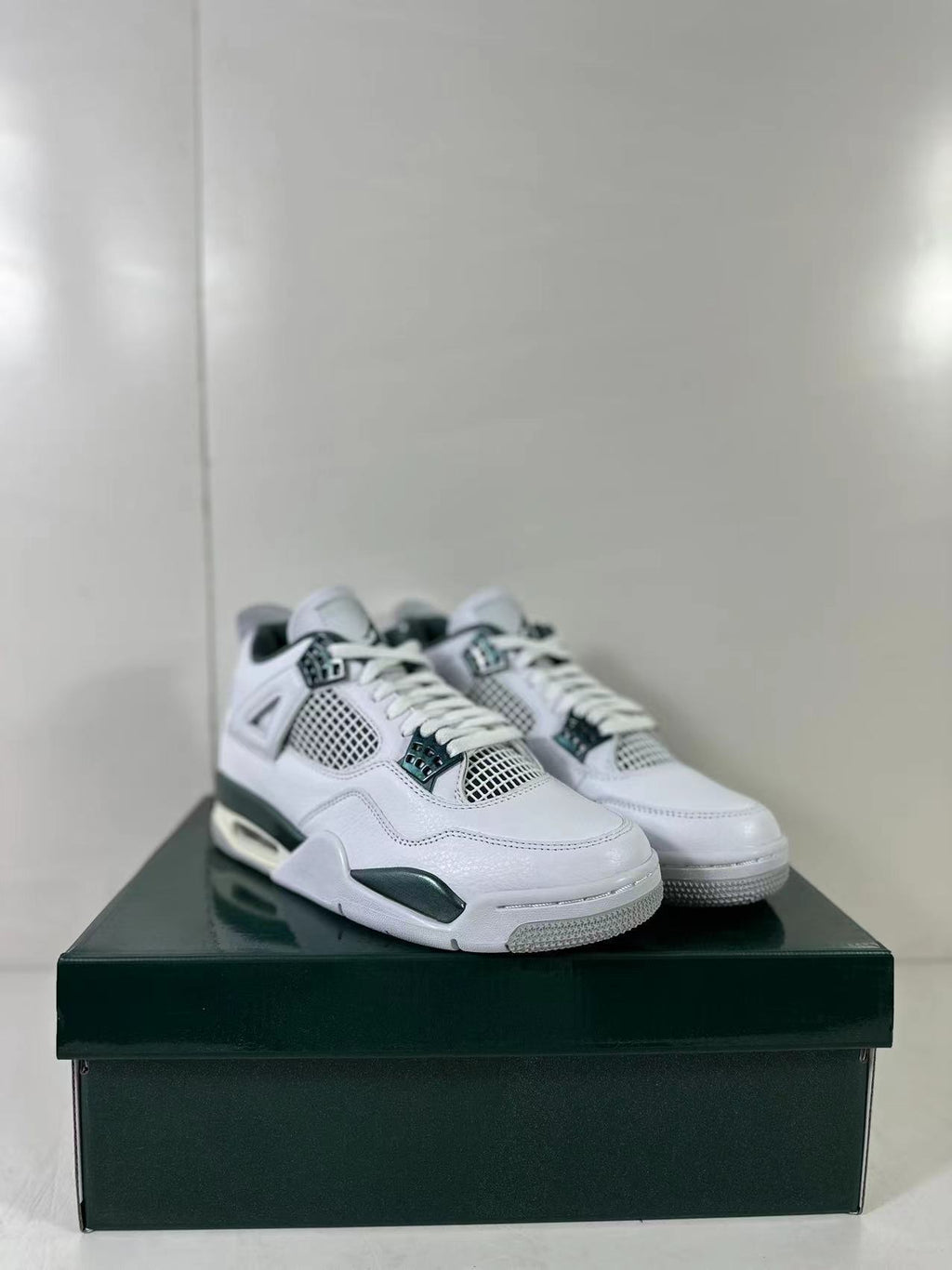 Air Jordan 4 Retro Bucks White Green Sneakers FQ8138-103 - product image from the listing.