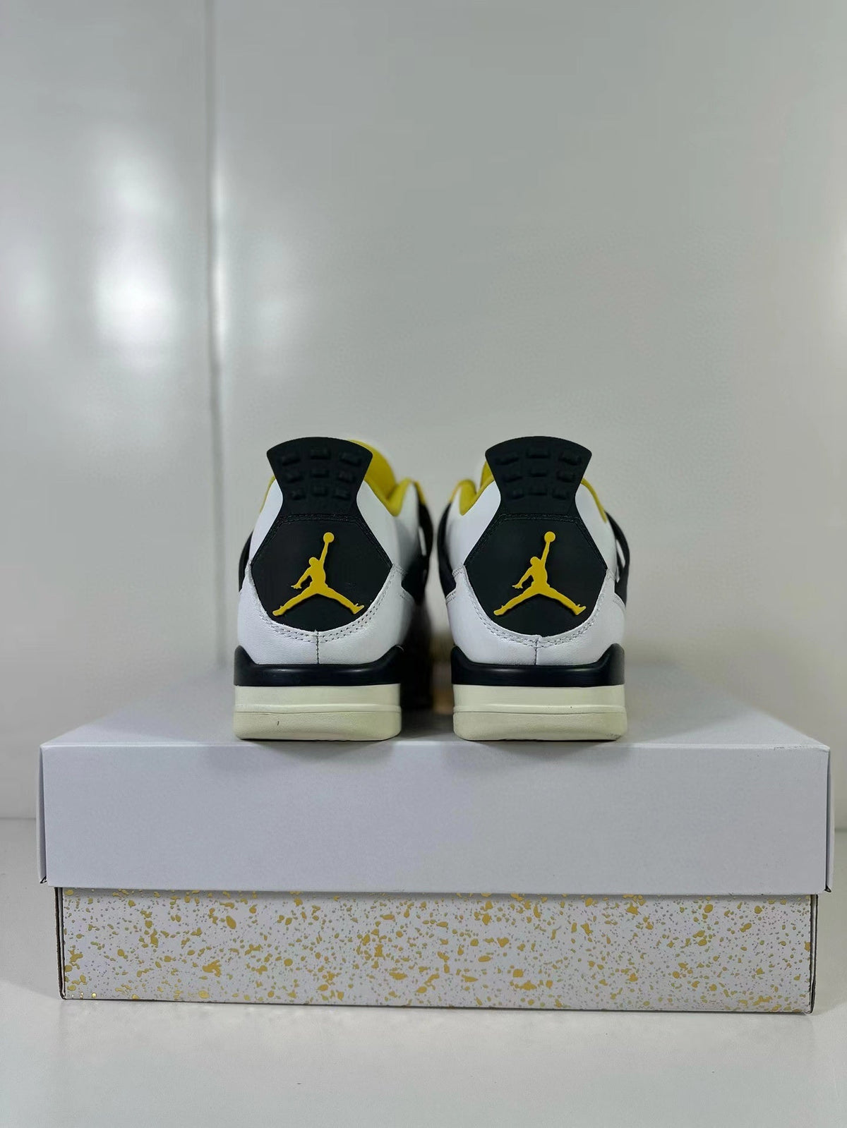 Air Jordan 4 Vivid Sulfur Sneakers White Yellow AQ9129-101 - product image from the listing.