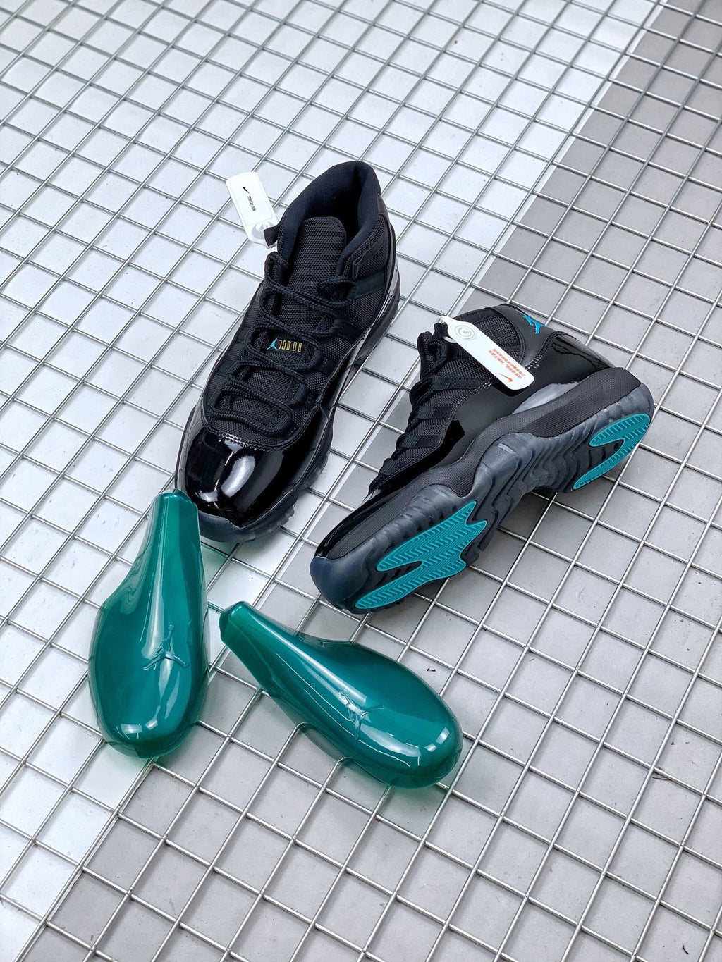 Air Jordan 11 Retro Gamma Black Sneakers 378037-006 - product image from the listing.