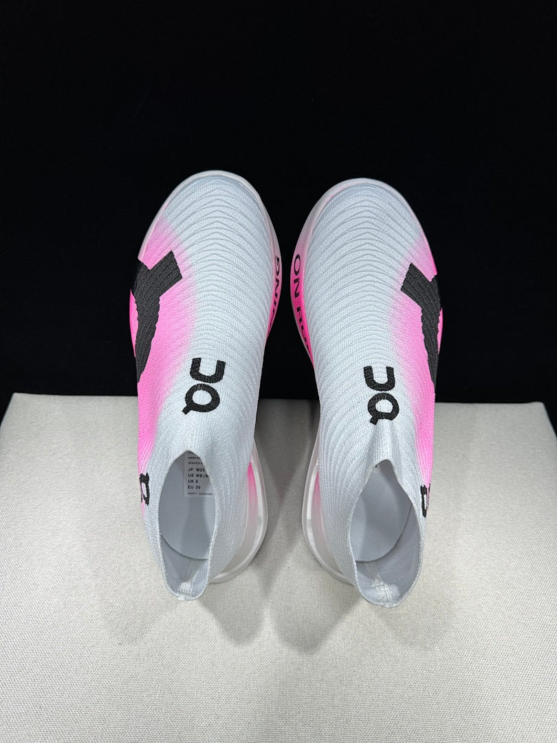 On Cloudboom Strike LS Running Sneakers in White/Pink - product image from the listing.