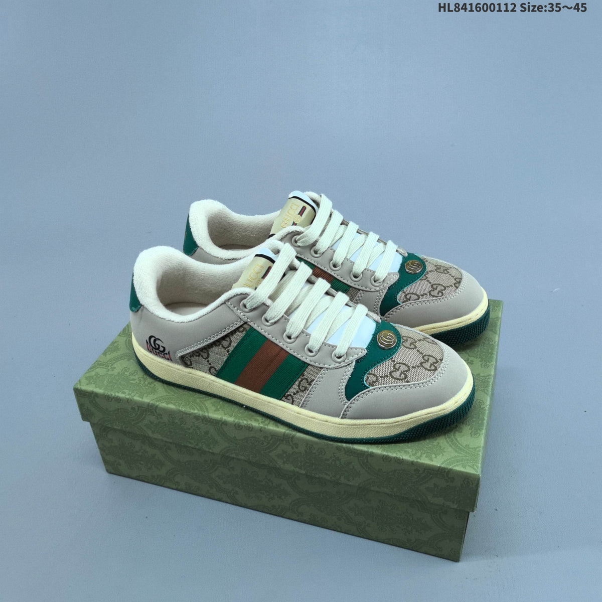 Gucci Screener Distressed Low-Cut Sneakers - product image from the listing.
