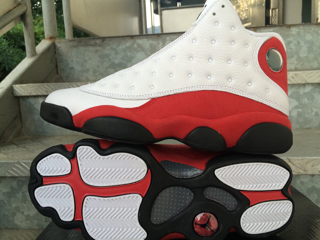 Air Jordan 13 Sneakers in White Red Black - product image from the listing.