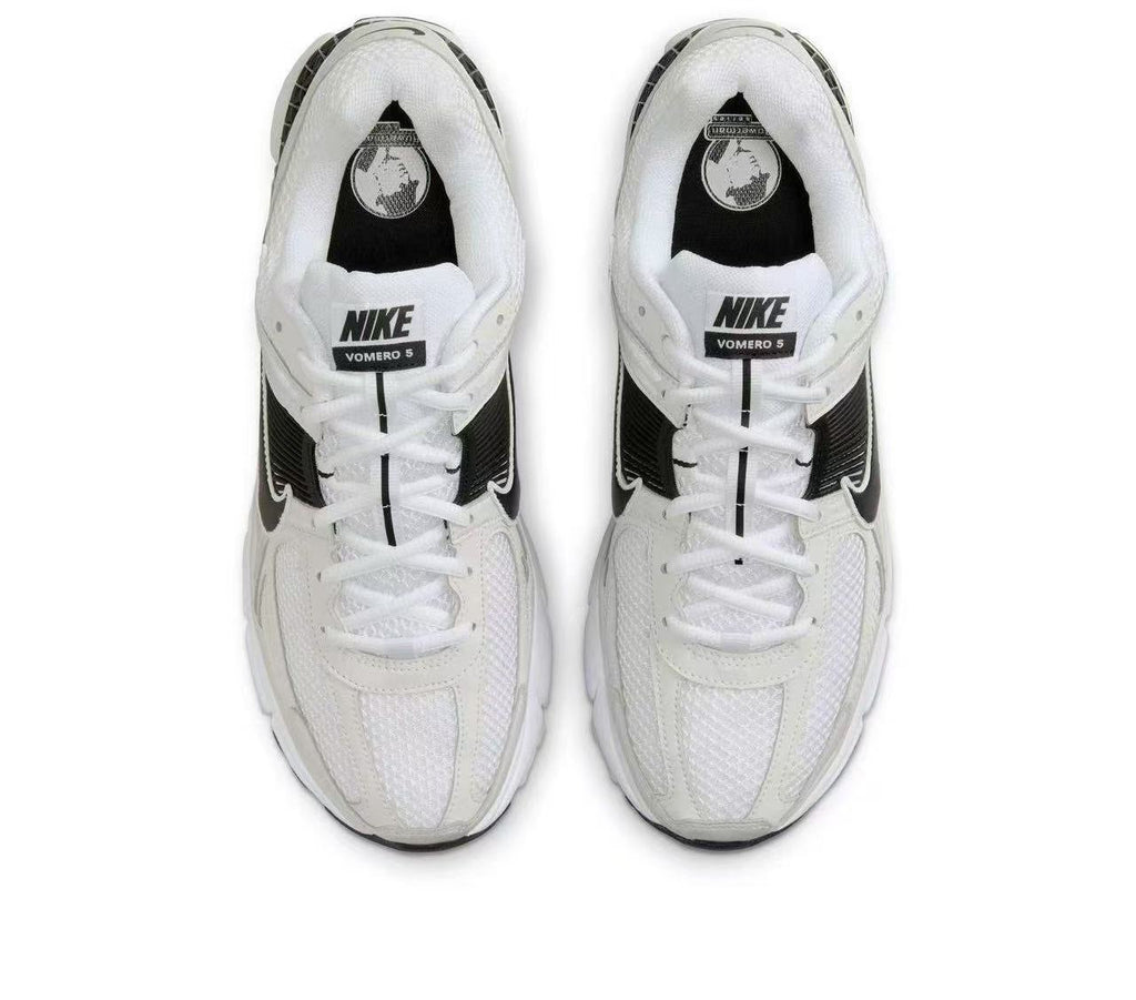 Nike Zoom Vomero 5 Sneakers in White and Black - product image from the listing.