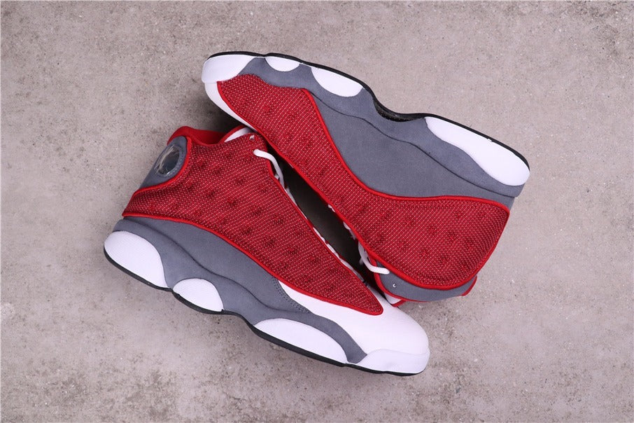 Air Jordan 13 Red Flint Sneakers 414571-600 - product image from the listing.